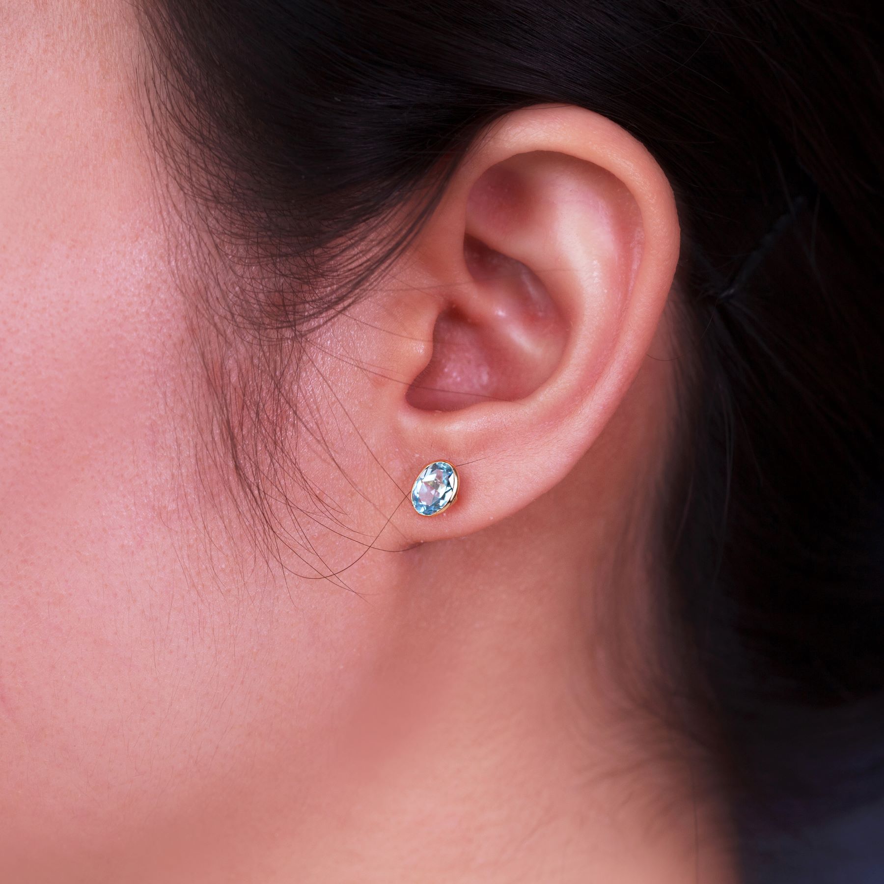 018-02-2026-E643TP(7x5) 2 Blue Topaz Oval Stud Earrings
